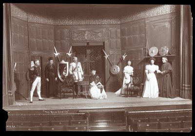 A scene from an amateur production of a play titled The Royal Family by Byron Company